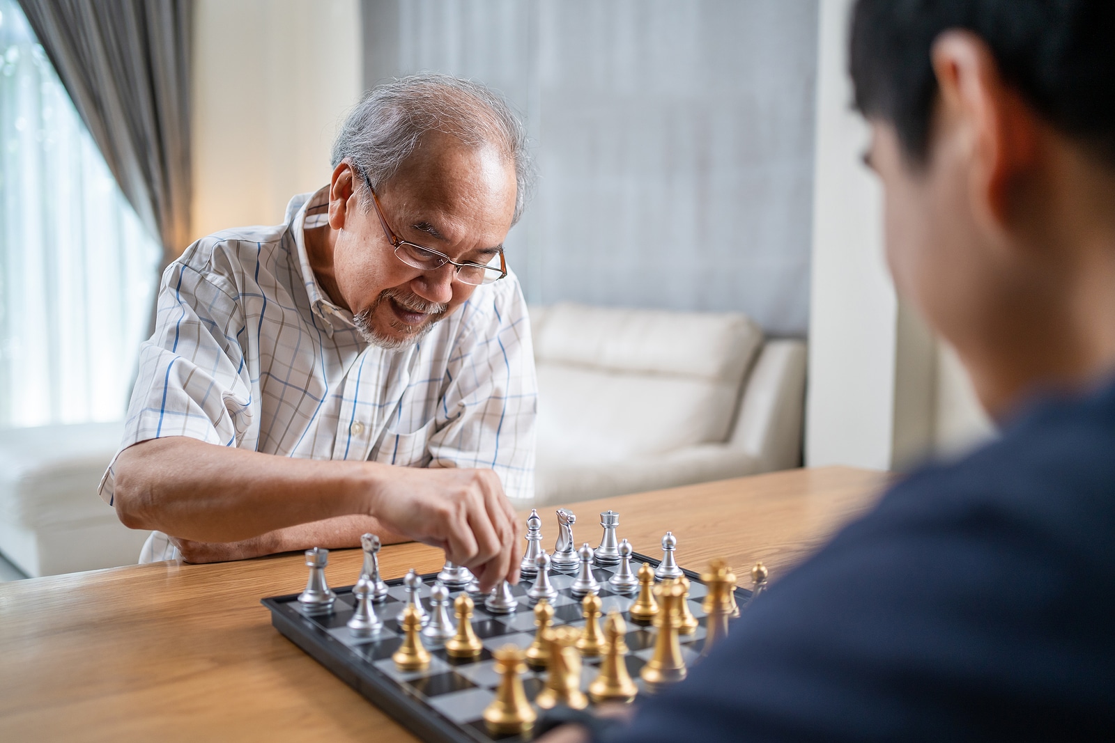 Local teens use chess to help seniors keep sharp minds, News